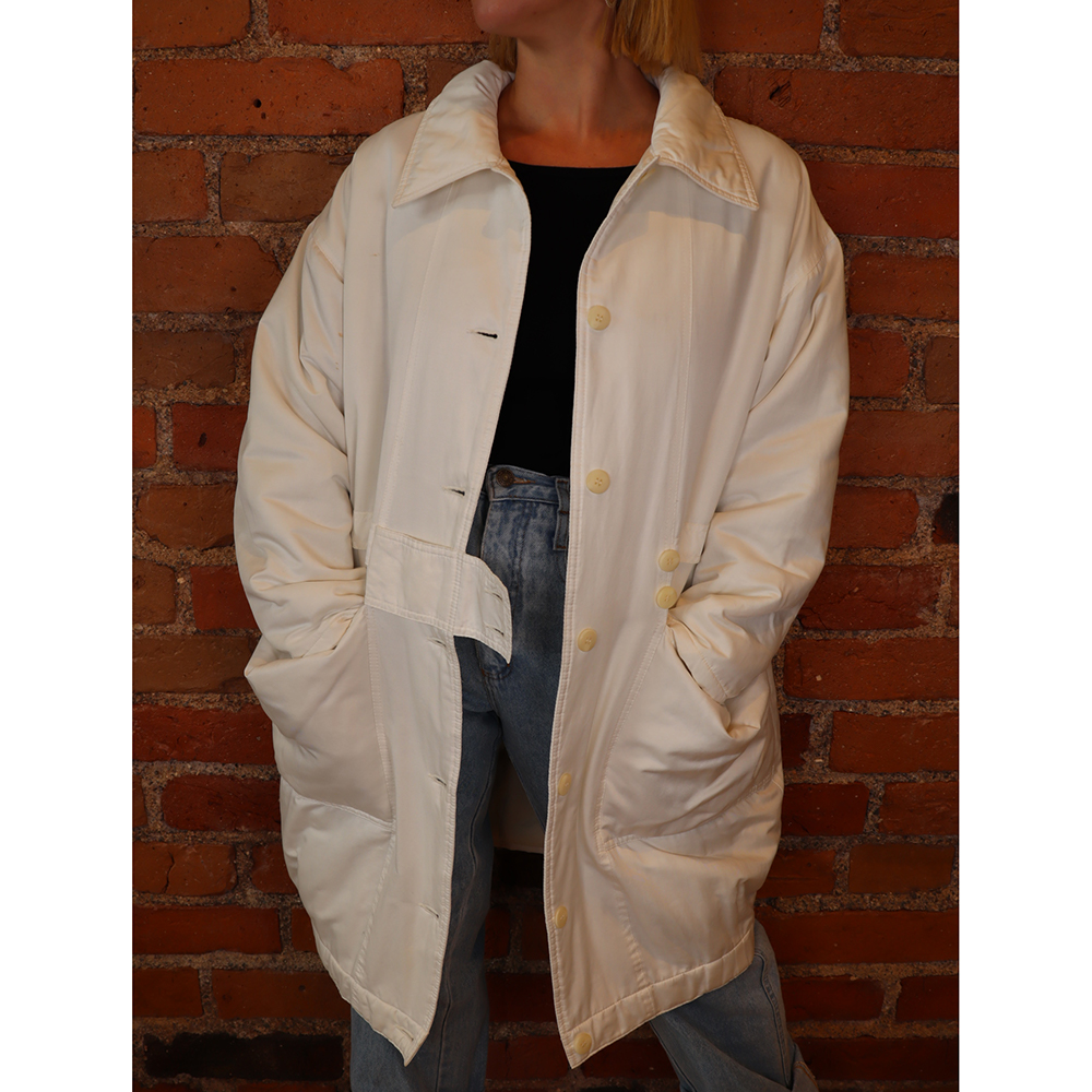 valkoinen toppatakki