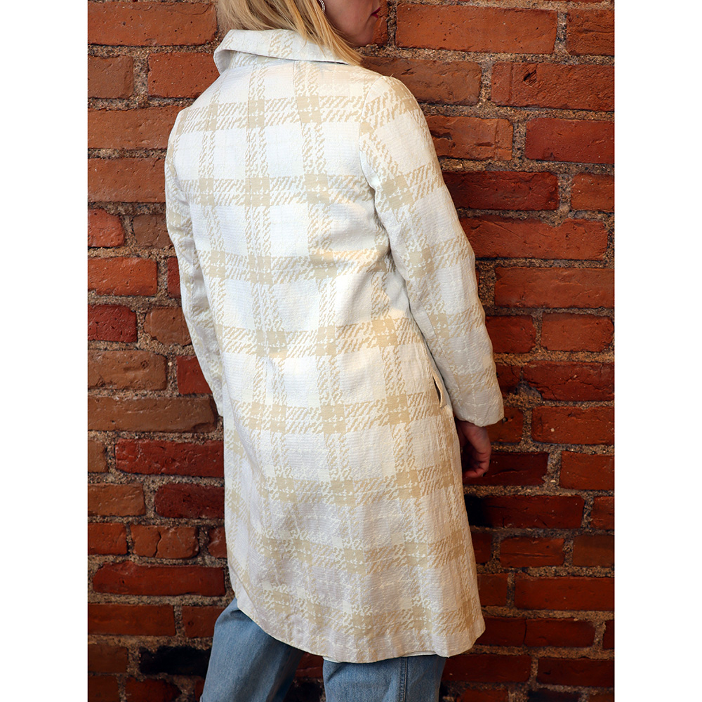 vaalea välikausitakki