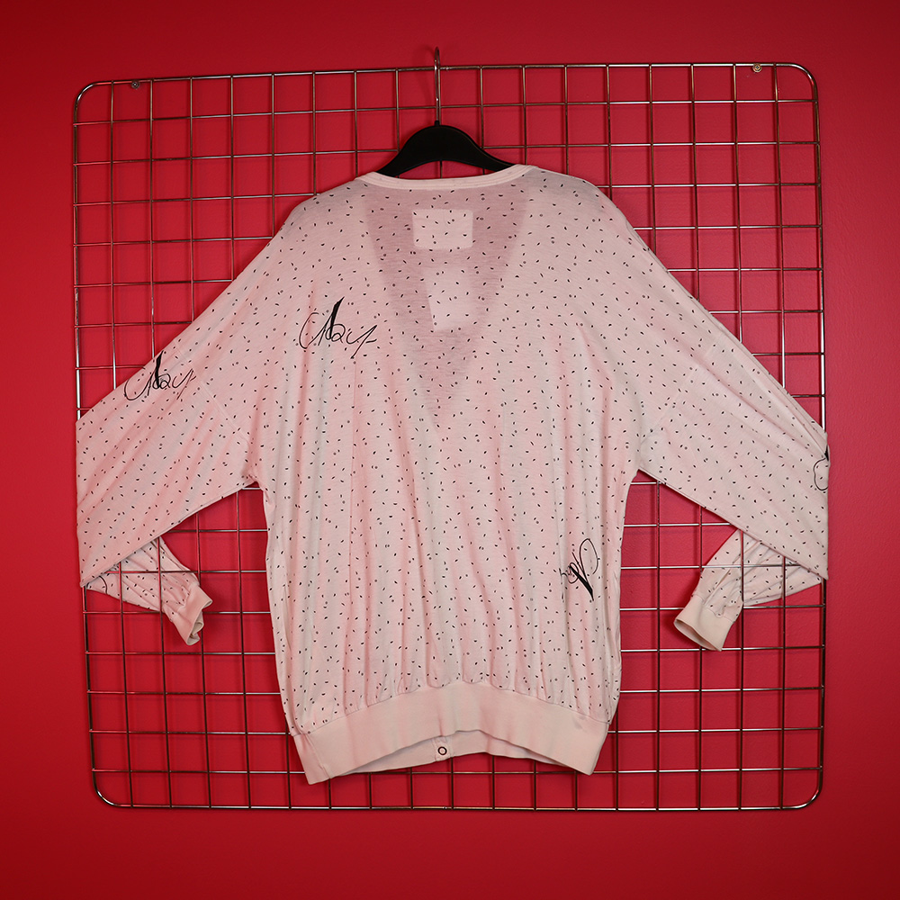 valkoinen trikootakki